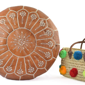 Moroccan leather pouf with straw pom pom basket