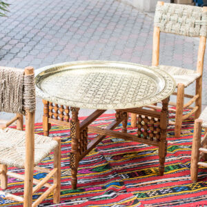 rattan dining chairs set with round brass table
