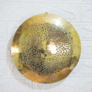 Wall sconce round shaped hanging on the white wall
