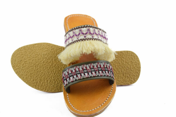 Moroccan sandals with long white hair
