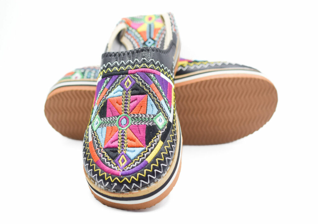 Moroccan slippers with colorful embroideries Berber patterns and rubber outsole
